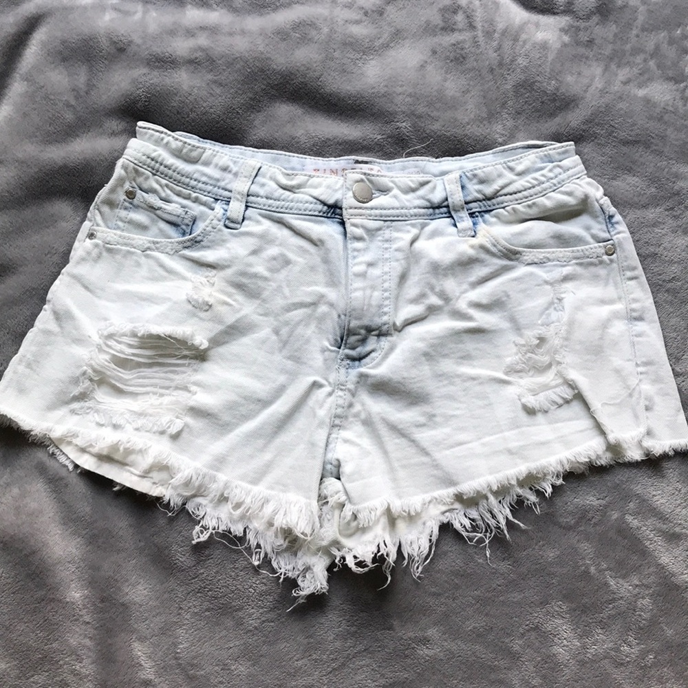 Distressed faded jean shorts
